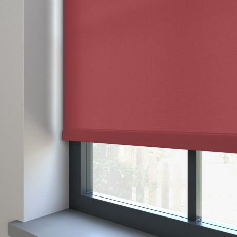 Our Burst Shiraz dimout roller blind in the living room window.